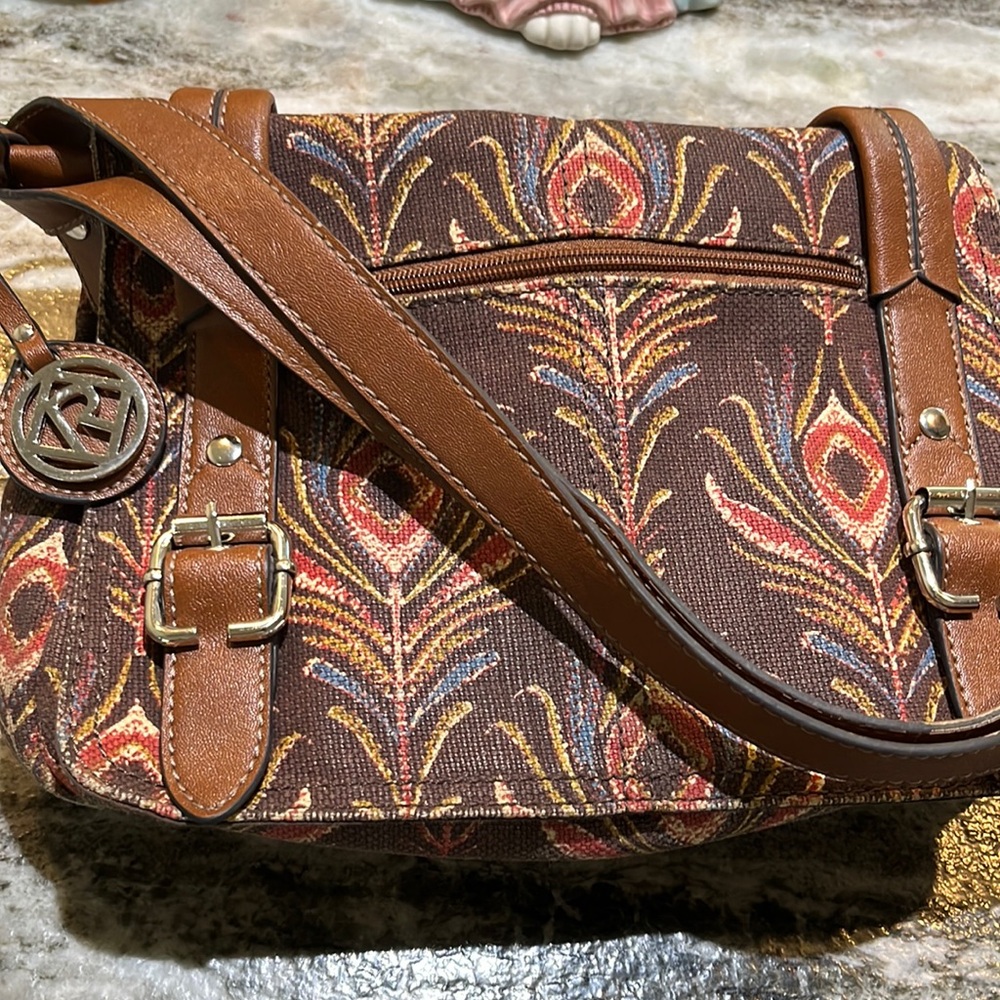 A woman’s Fossil purse